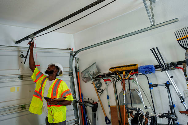 Professional Garage Door Panel Replacement technician working in Bastrop County County, TX
